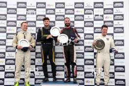 Silverstone Festival, Silverstone 2024. 23rd-25th August 2024 Free for editorial use only Podium (l-r) 170 Jonathan Mitchell Ford Lotus Cortina, 198 Jake Giddings - Paul Streather - Ford Lotus Cortina, 711 Guy Smith - Ford Lotus Cortina   