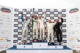 Silverstone Festival, Silverstone 2024. 23rd-25th August 2024 Free for editorial use only Podium (l-r) 59 Richard Cook - Shelby AC Cobra, 68 Gregor Fisken - Chris Ward - AC Cobra , 23 Gary Pearson - John Pearson - Jaguar E-type, 