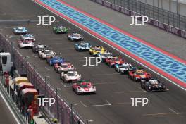 Start of the 1812KM of Qatar. #5 PORSCHE PENSKE MOTORSPORT Porsche 963 Hypercar of Matt Cambell, Michael Christensen and Frederic Makowiecki and #7 TOYOTA GAZOO RACING Toyota GR010 - Hybrid Hypercar of Mike Conway, Kamui Kobayashi and Nyck de Vries